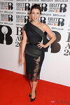 Dannii Minogue con un vestido de J'Aton Couture en la alfombra roja de los Brit Awards 2014