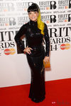 Lily Allen con un vestido de Norrell en la alfombra roja de los Brit Awards 2014
