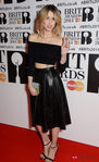 Peaches Geldof de River Island en la alfombra roja de los Brit Awards 2014