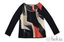 Jersey de franjas asimétricas de la colección primavera/verano 2014 de Rachel Roy