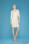 Vestido con cuello de pico de la colección 'Dolores Promesas Resort' para primavera/verano 2014