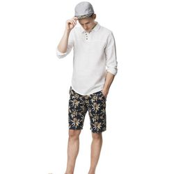 Bañador con estampado floral y polo blanco de la colección para verano 2014 de Springfield