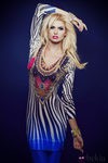 Adriana Abenia con un vestido de print animal de Barbarella otoño/invierno 2014
