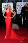 Heidi Klum con un vestido de escote asimétrico en los Globos de Oro 2014
