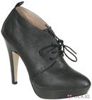 Botines negros con cordones de Lorena Carreras, colección otoño/invierno 2011