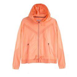 Cortavientos naranja de la colección deportiva 'Start Moving' de Bershka