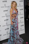 Rosie Huntington-Whiteley con un vestido de Atelier Versace en la Gala amfAr de París 2015