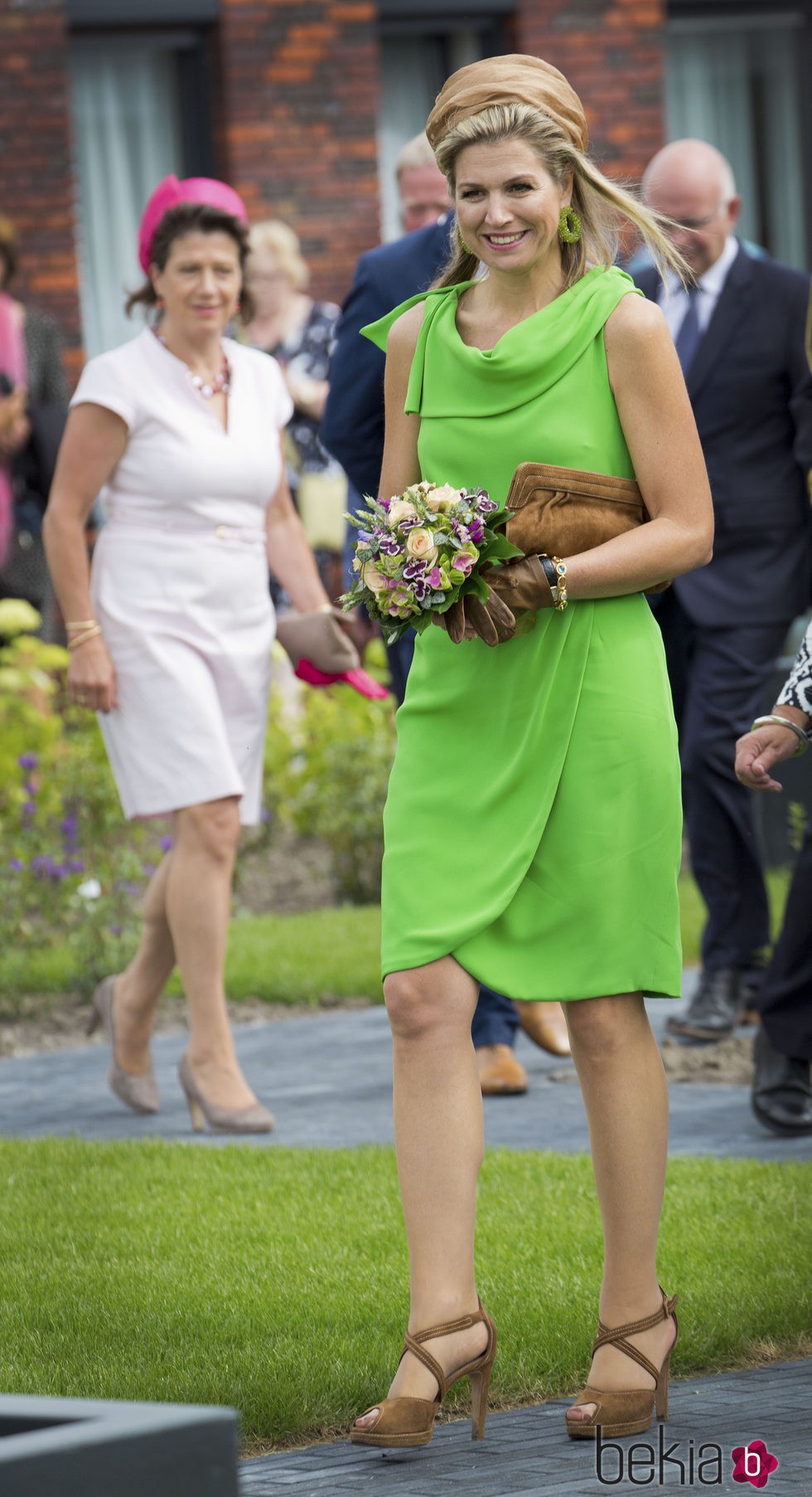 La Reina Máxima de Holanda con un veraniego vestido verde manzana