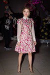 Lea Seydoux con vestido fucsia con motivos florales dorados en la James Bond Spectre Party en Londres