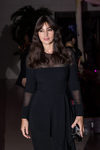 Monica Bellucci con vestido negro con transparencias en la James Bond Spectre Party en Londres