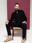 Bradley Wiggins con un cardigan de su colección invierno 2016 para Fred Perry