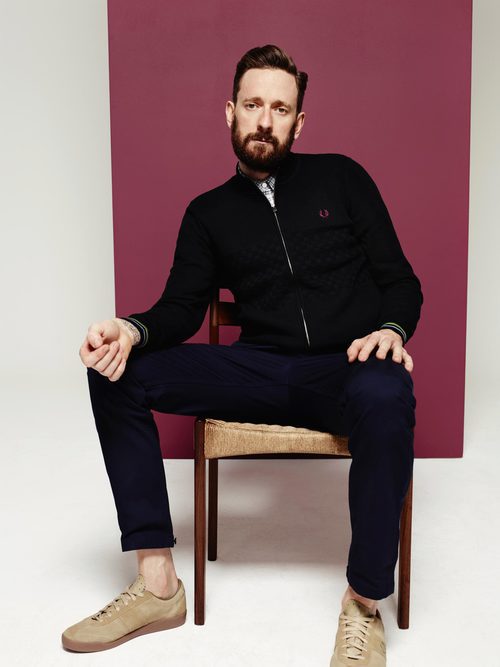 Bradley Wiggins con un cardigan de su colección invierno 2016 para Fred Perry