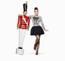 Katy Perry con camiseta gris y falda negra de la colección Navidad 2015 de la firma H&M