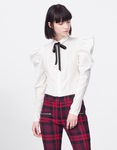 Camisa con hombreras y pantalones de cuadros rojos y negros de la colección Tartán de Invierno 2015/2016 de Blanco
