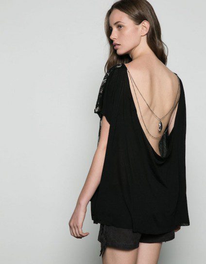 Minivestido negro con escote en la espalda de la colección Fiesta invierno 2015/2016 de Bershka