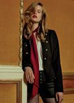 Chaqueta marrón y lazada al cuello roja de la colección Navidad 2015 de Primark