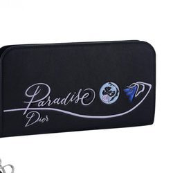 Cartera de mano rectangular en negro con detalle floral de la línea 'Dior Paradise' 