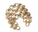 Brazalete dorado con círculos concéntricos de Claire's primavera/verano 2016