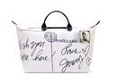 Bolso 'Le Pliage' blanco con firma de Jeremy Scott para Longchamp