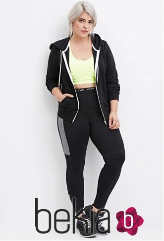 Chaqueta deportiva larga negra y cropped top amarillo de Forever 21