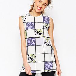 Blusón de cuadros blancos y pantalón negro de la colección de Chi Chia para ASOS Africa