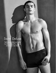 Look bañador corto pegado al cuerpo negro de la colección logotipo de Calvin Klein 2016 para hombres 