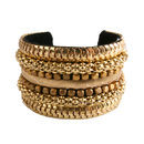 Brazalete dorado de la colección de verano 2016 de Lola Casademunt