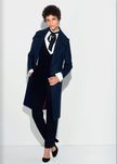 Mono negro y camisa con volantes en cuello y mangas y abrigo azul klein de la colección otoño/invierno 2016/2017 de Etam